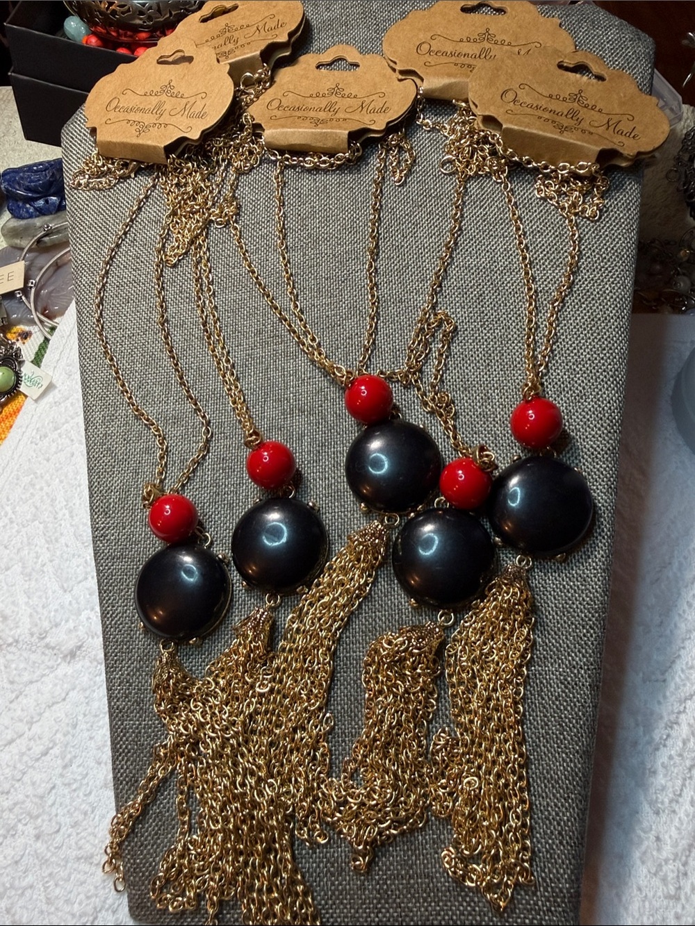 Gold Tone Chain Necklace with Black Disc and Red Bead -